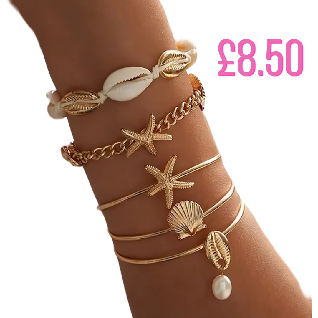 Jewellery stacked starfish and shell bracelets 🐚