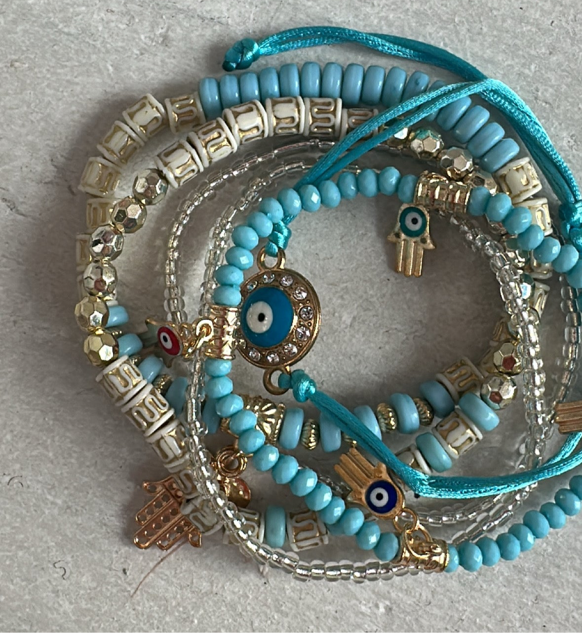 Jewellery stacked Evil Eye & hamma hand bracelets 🧿🪬 3 colours to choose from