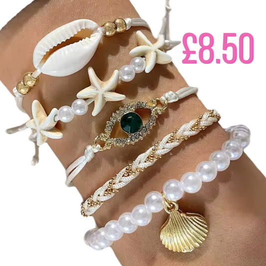 Jewellery stacked Pearl, Evil Eye & Shell bracelets 🐚